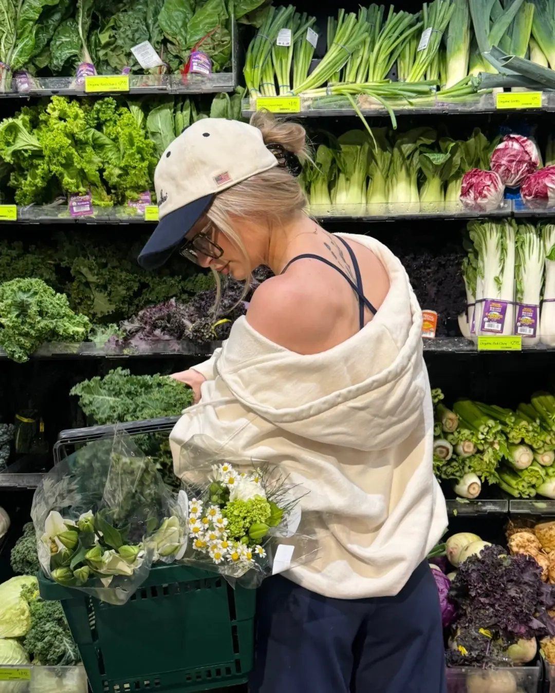 Starra shopping for fresh produce and flowers at the grocery store